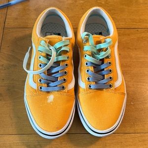 NWOT Vans unisex women’s 8.5 yellow shoes.  Small dot of bleach on r front shoe